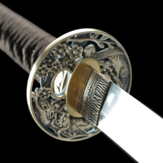 The Obsidian Kin-Ryu hand forged samurai sword and katana featuring a black and gold dragon scabbard
